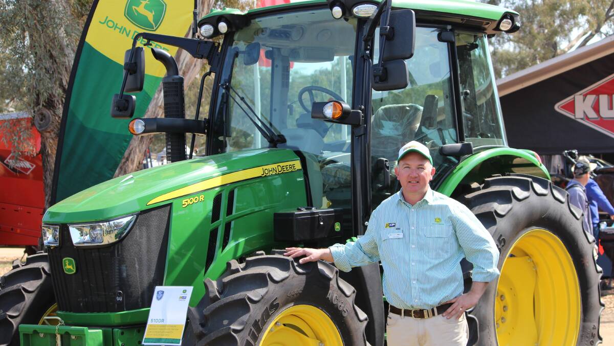 Hutcheon & Pearce group sales manager Andrew Sands with the John Deere 5100R Enforcer