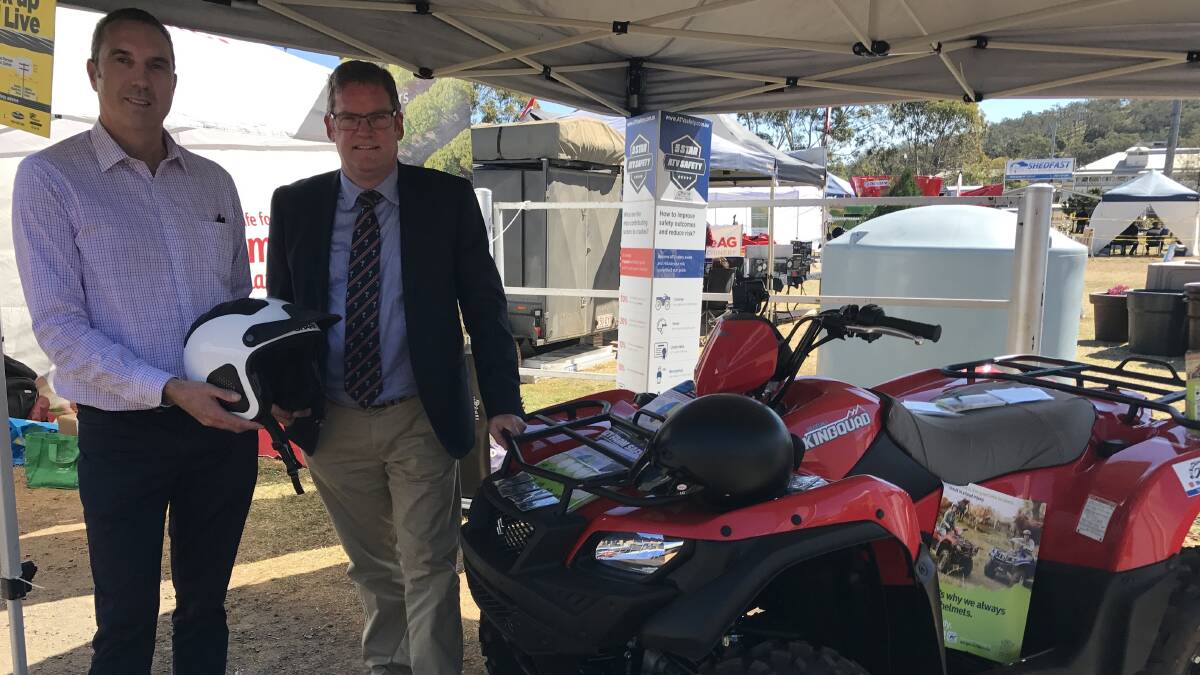 Mark Collins FCAI ATV Manager and Dr John McVeigh federal MP for Groom, at the launched the industry’s Shark helmet giveaway at Queensland’s Beef Expo in Toowoomba.