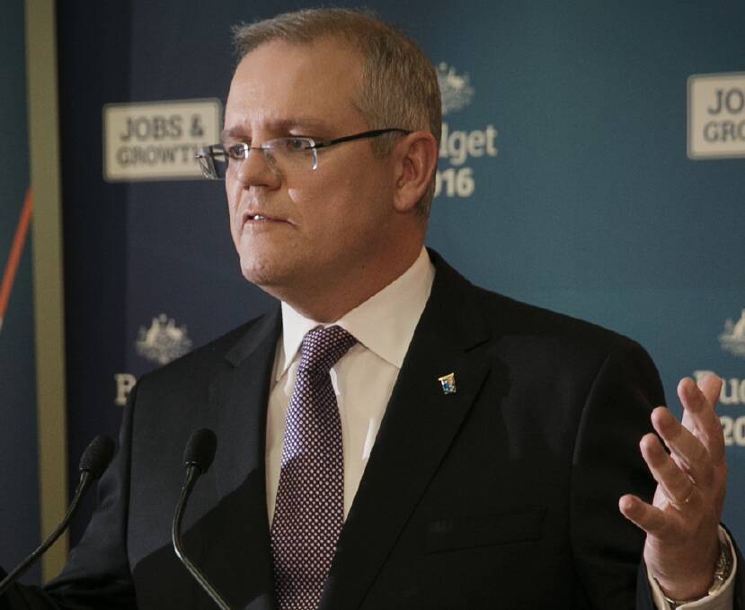“We can't go around paying for backpackers by having Australians pay higher taxes on their incomes or other things like that," says Treasurer Scott Morrison.