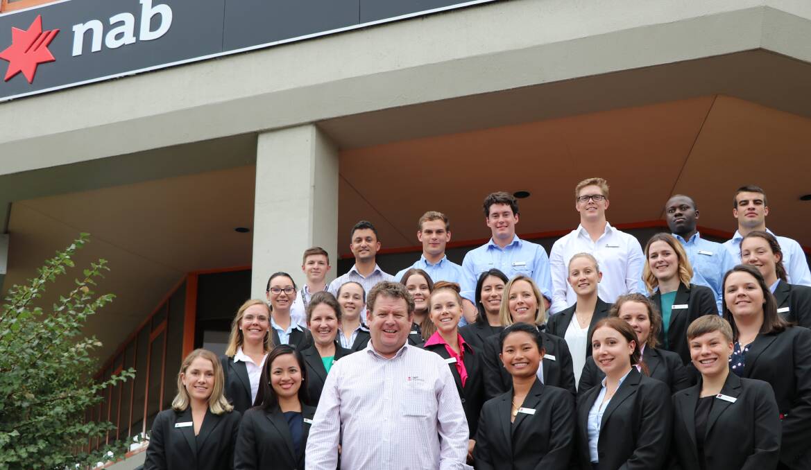 NAB agribusiness general manager, Khan Horne, with the bank's first intake of 25 graduate recruits for 2017 in Albury. 