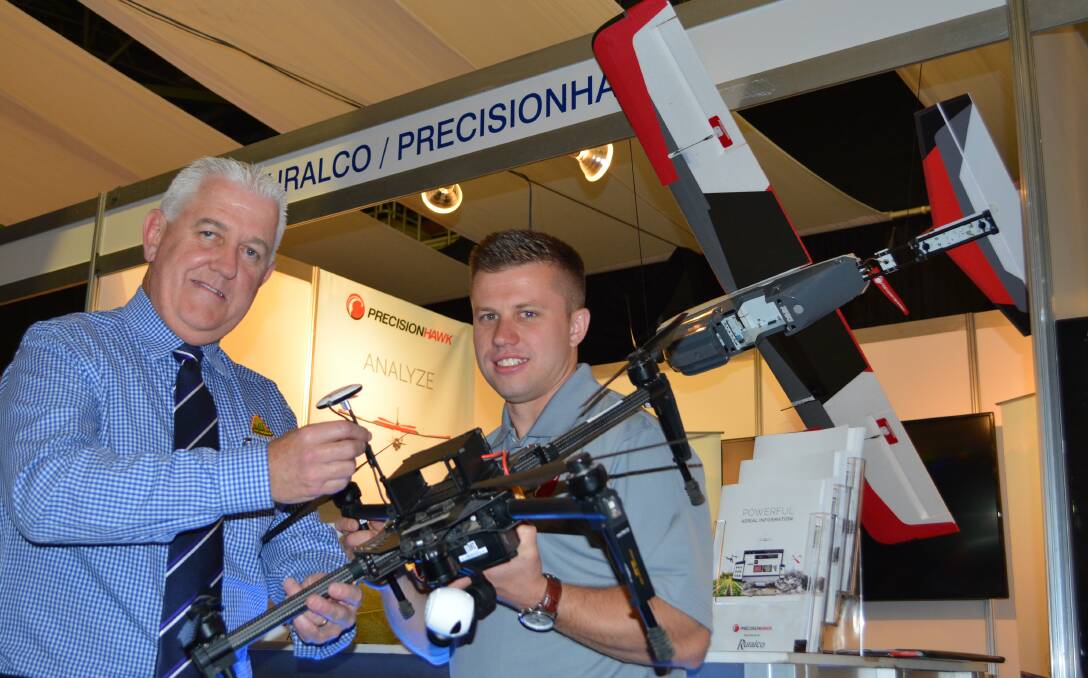 Ruralco rural supplies general manager, Greg O'Neil,with a DJI Matrice 100 drone with PrecisionHawk's Australian general manager, Nat Hyde, on display at the NFF Congress and now being sold through Ruralco branches.