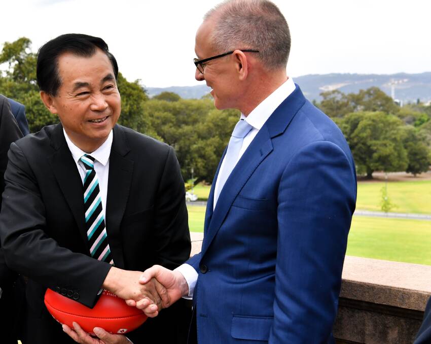 Shanghai CRED's Gui Guojie, with South Australian Premier, Jay Weatherill announcing Chinese sponsorship for the AFL.