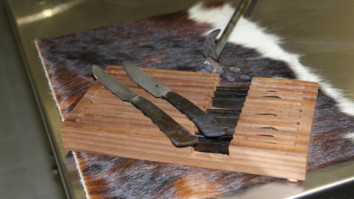 Handcrafted steak knives are just one of the special touches at Tenderhooks.