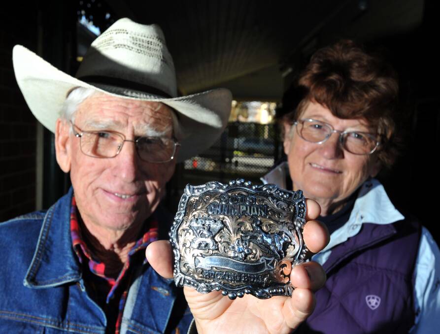 A WINNING TEAM: John Gill and his wife Margaret with one of the many awards they have won over the years for their team of rodeo stock. 
