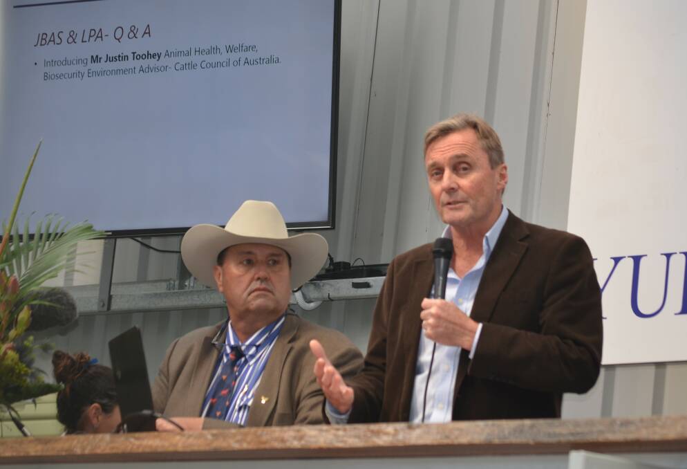 Cattle Council of Australia’s animal health and biosecurity expert Justin Toohey speaking at the Yulgilbar beef expo, watched by Yulgilbar general manager Rob Sinnamon.