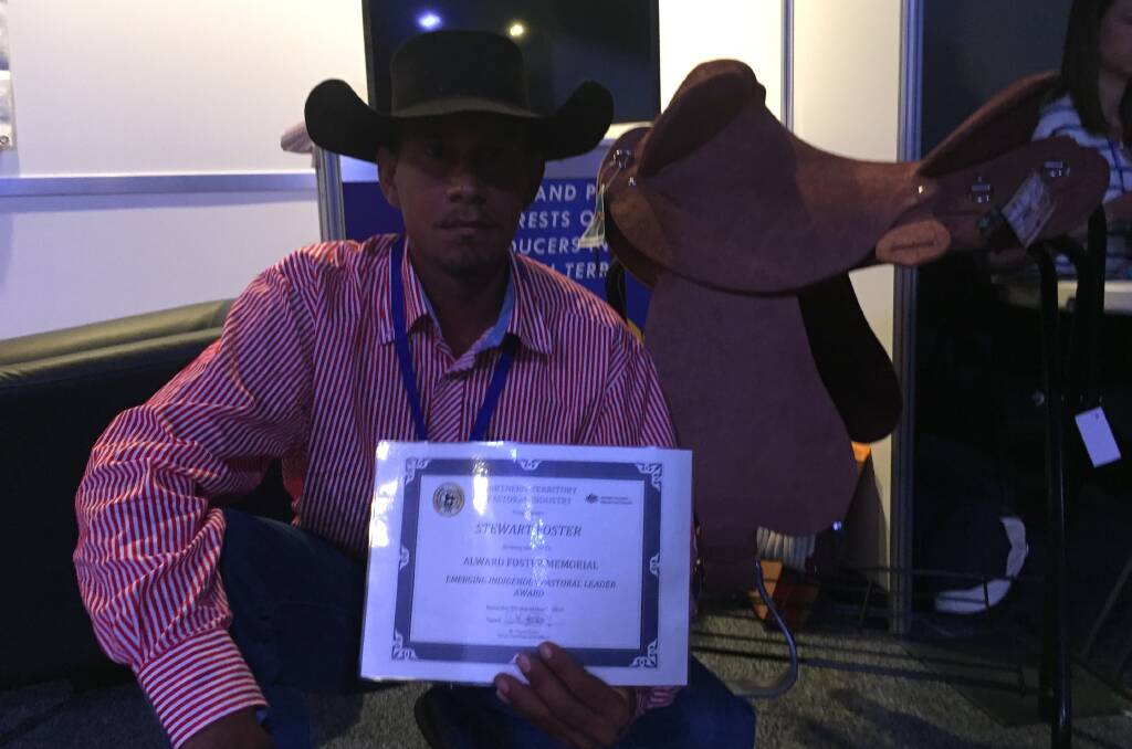 Leading hand at Morstone Downs, near Camooweal, 22-year-old Stewart Foster with his leadership award at the NTCA conference in Darwin last week. 