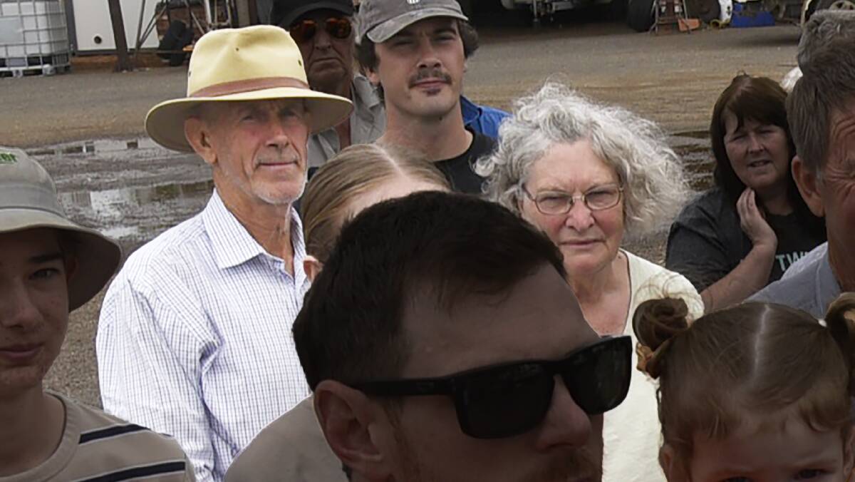 Leanne and Peter Pola (senior) highlighted from a mine protest gathering. Picture: Chris McLennan. 