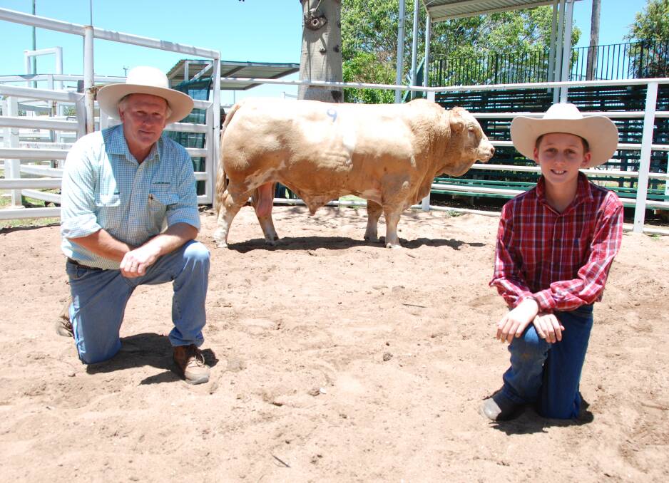 Landmark's Ross Jorgensen with Tom York and the $18,000 top priced bull of the Billa Park Simmentals Clermont bull sale on Thursday.