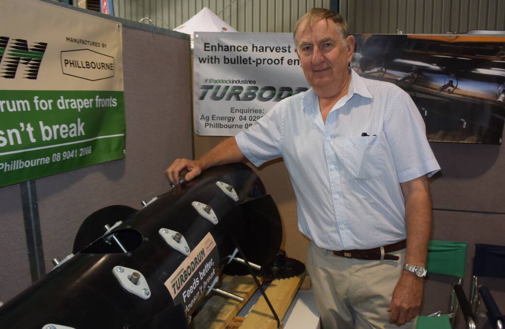 Richard May, with a model of the Turbodrum feeder drum, which can be retro-fitted to harvesters, at the Wimmera Machinery Field Days.