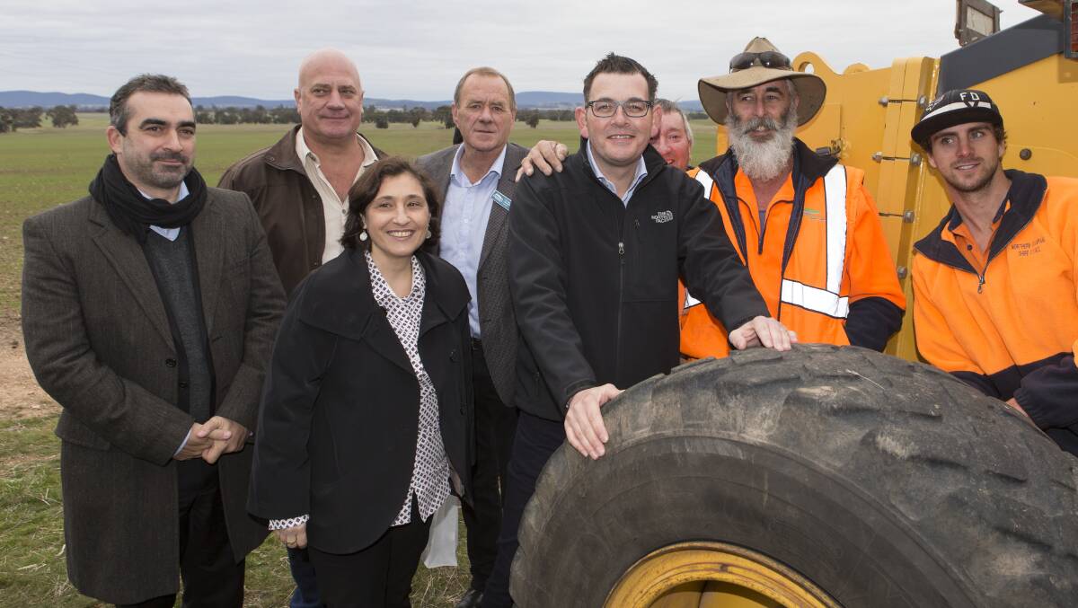 From left Franck Woitez, managing director Neoen Australia, Nectar Farms managing director Stephen Sasse, Victorian Minister for Energy Lily D'Ambrosio, Northern Grampians mayor Tony Driscoll, Victorian Premier Daniel Andrews and the construction team at the site of the Bulgana wind farm. Photo - Peter Pickering.