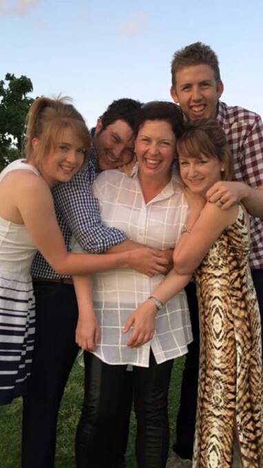 HAPPIER TIMES: The Collie family before the accident, Zoe, Craig, Beck, Sarah and Daniel, mother Deidre and father Max are still in Melbourne with their daughter.
