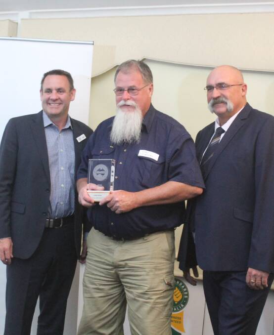 MSA WINNER: MSA Producer of the Year, Benalla grazier Gary Coventry, with MLA managing director, Richard Norton, and cricketer Merv Hughes. Picture: Andrew Miller. 