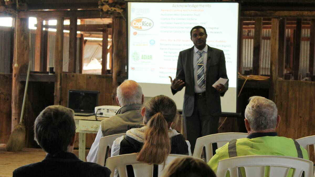 Aduli Malau shares his findings with the audience at Cunnamulla.