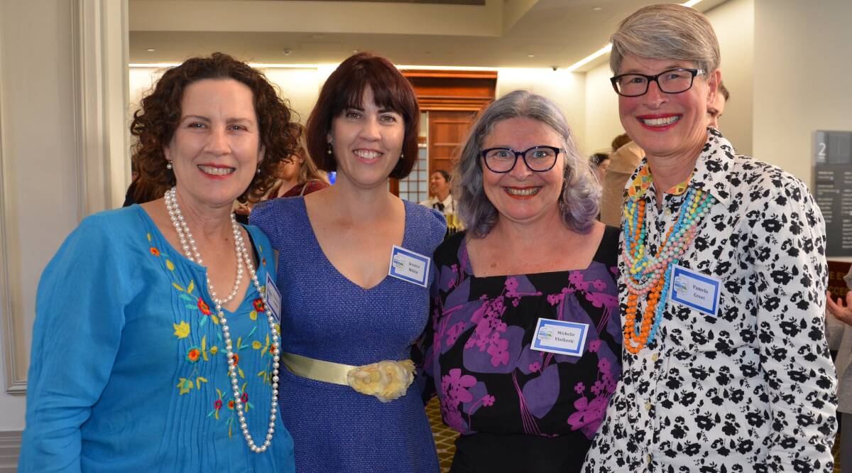 Pam Greet, left, in her favourite Jen Geddes What2Ware shirt, with QRRRWN friends including Jessica White and Michelle Vlatkovic, wowed high tea attendees with her news that the fashion addiction can be broken. Photo by Col Jackson.