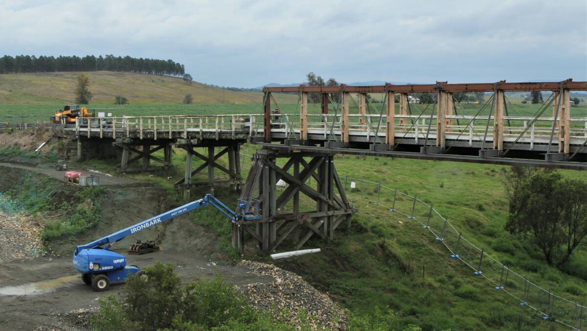 Some of the machinery gathered by the contractors to undertake the demolition of the bridge.