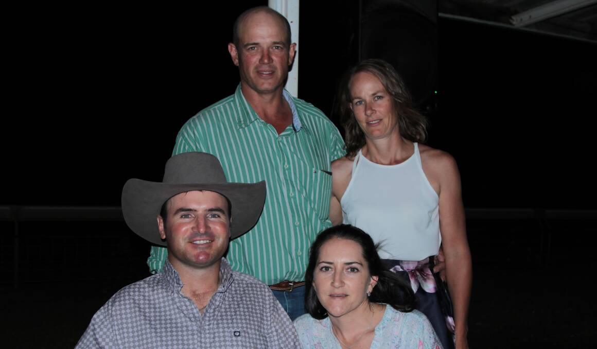 Rob Cook, pictured bottom left, with Phil and Narelle Dearden and his wife Sarah, at a fundraising event in Isisford.