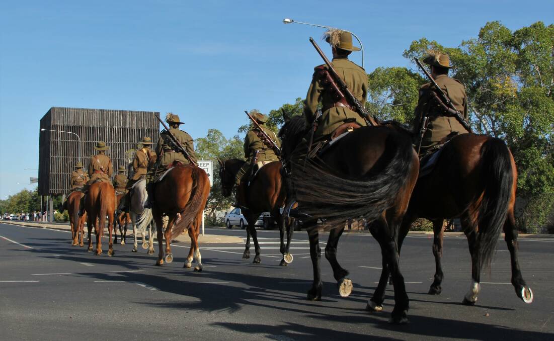 Living history: The re-enactment troop passed the Tree of Knowledge, a significant moment, as Light Horse troops were sent to Barcaldine during the 1891 Shearers' Strike. Pictures: Sally Cripps.