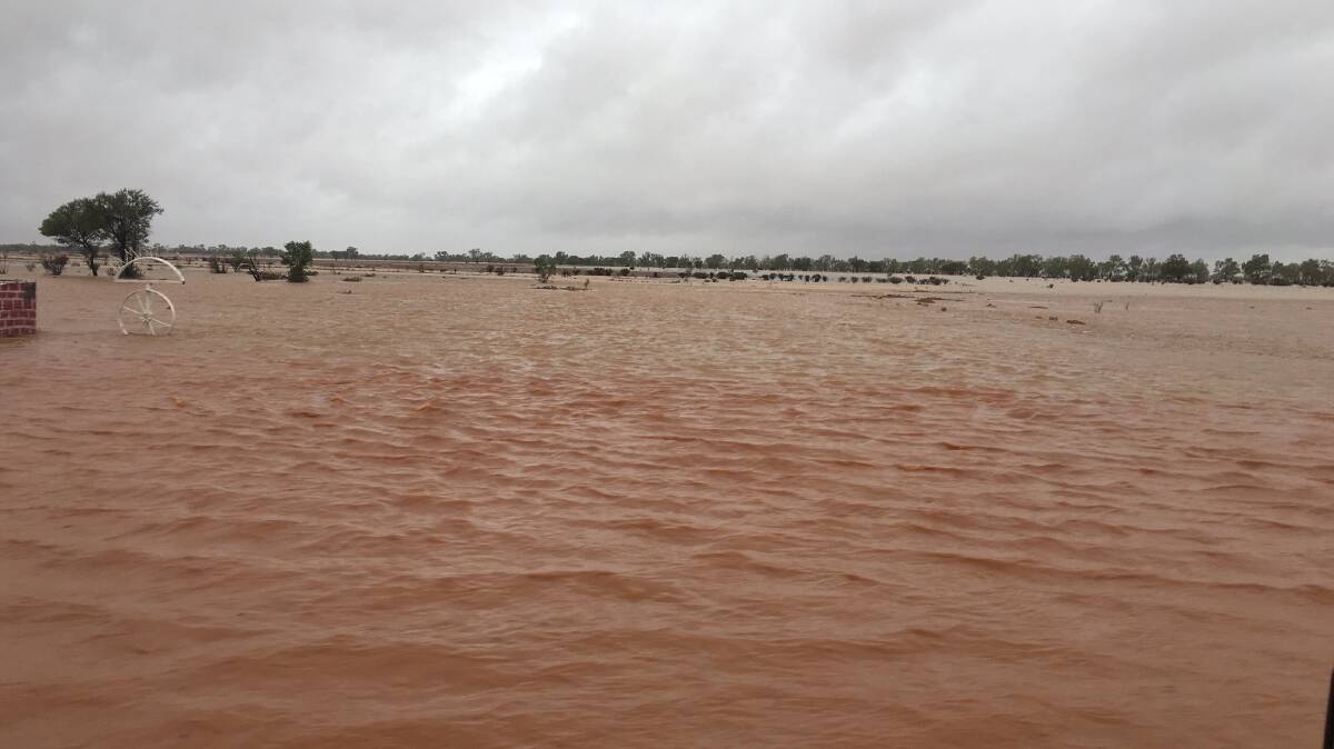 The scene at the Yambutta turnoff, south of Quilpie, on Saturday. Most of this water will end up in Kyabra Creek and run into the Cooper. Picture: Hayley Hughes.