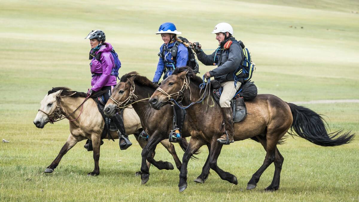 C'mon Aussie: Will Comiskey, right, pictured with Heidi Telstad and Marcia Hefker-Miles on their penultimate day on the steppes of Mongolia. Picture: Richard Dunwoody @ Mongol Derby.