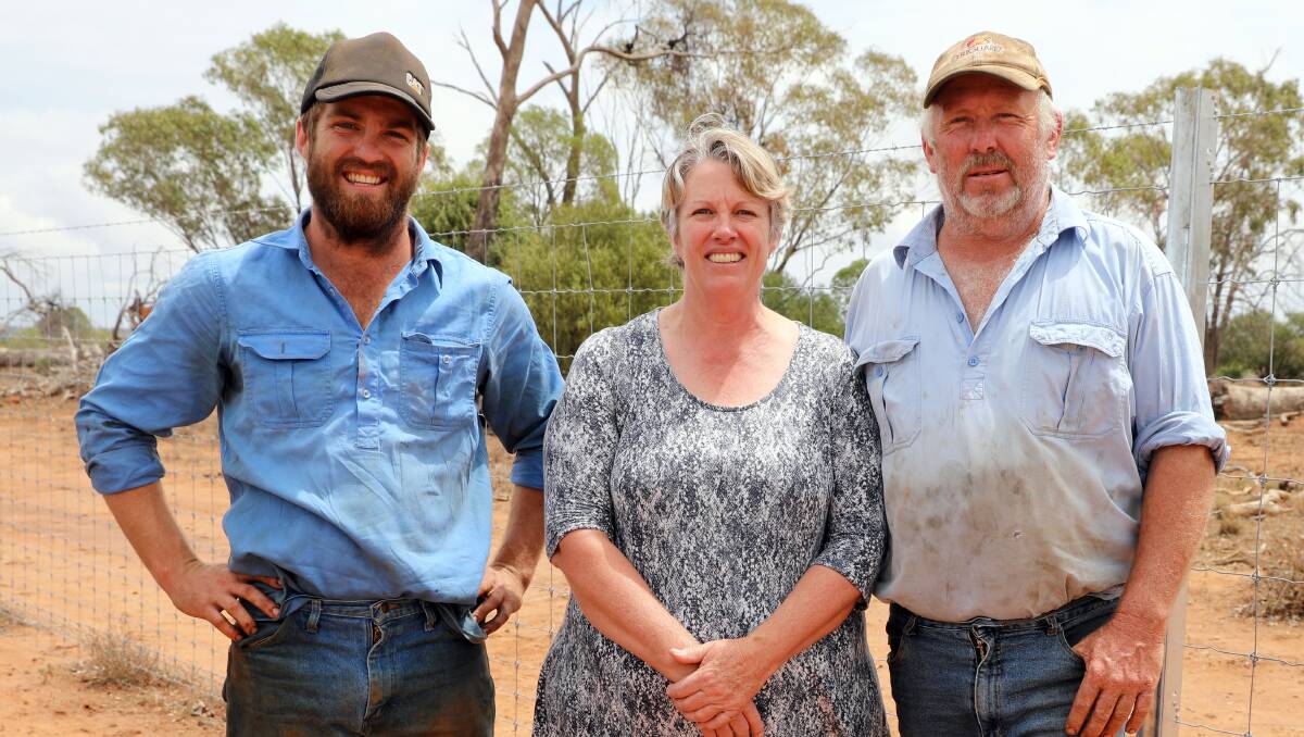 Matthew, Jan and Graham Chambers on their completed fenceline.