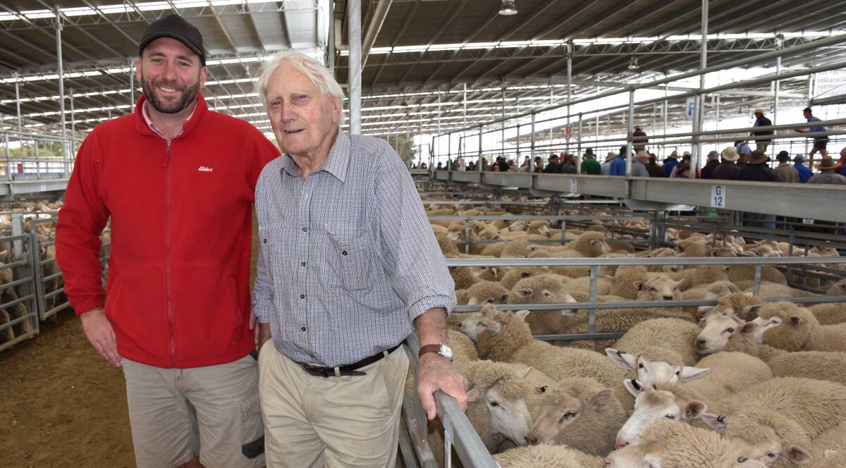 Ian Heard, Glenthompson, sold 246 July 2016 drop lambs, pictured with Elders Hamilton agent Andrew Button.