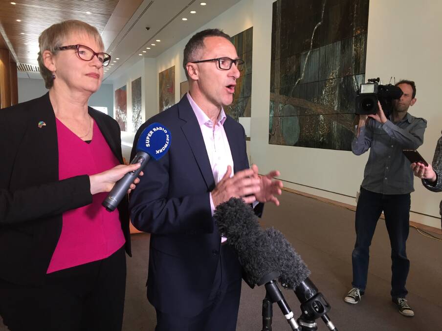 Greens agriculture spokesperson Janet Rice (left) and party leader Richard Di Natale facing the media today, saying the party's crucial position on the sugar code disallowance motion could be decided this week.