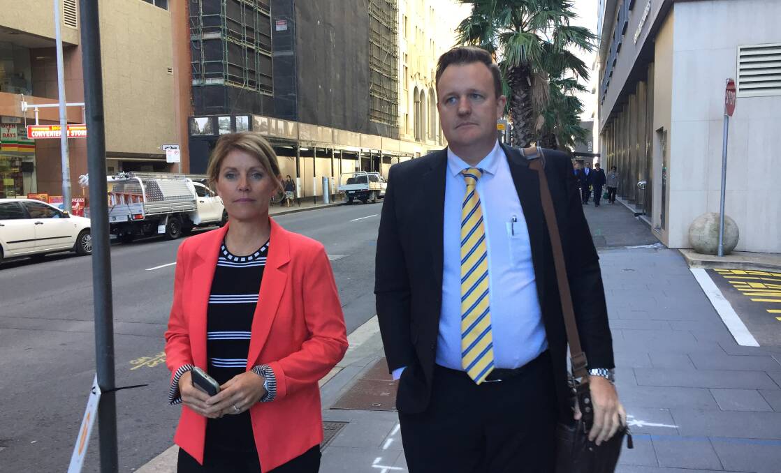 Northern Territory Cattlemen’s Association CEO Tracey Hayes walking into court with Consolidated Pastoral Company CEO Troy Setter who also gave evidence.