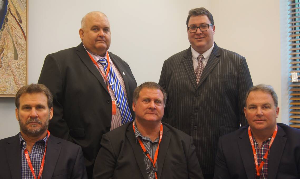 BURDEKIN sugar cane farmers in Canberra today lobbying federal politicians - Alan Parker (back left) and Queensland Nationals MP George Christensen (back right) and Peter Hall (from left), Robert Zandonadi and Lawrence Dal Santo.