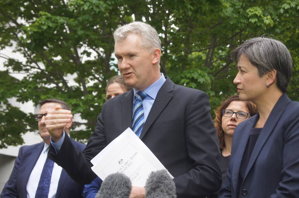 Labor members Tony Burke and Penny Wong talking to media in Canberra this week about the Murray Darling Basin Plan.