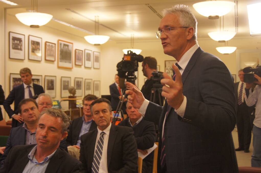 Nationals Murray MP Damian Drum addresses the party room meeting in Canberra today.