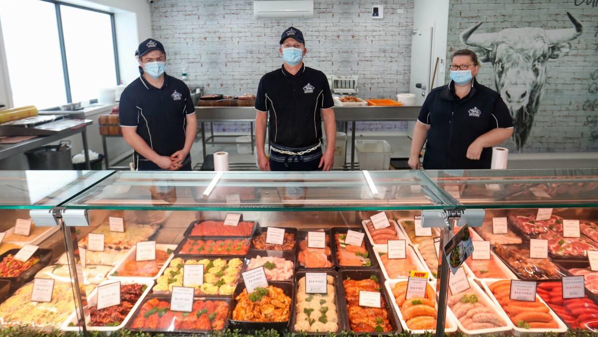 STOCKED: Matt Caveny, Adam Bean and Tracey Harris at Lucas Brothers Butchers, which has cautioned against panic buying as uncertainty hits supply chains. Picture: Morgan Hancock, Warrnambool Standard.
