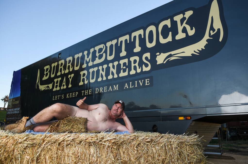 BIT OF FUN: Hay runner Brendan Farrell hopes a cheeky calendar will give his drought relief efforts maximum exposure. Picture: MARK JESSER 