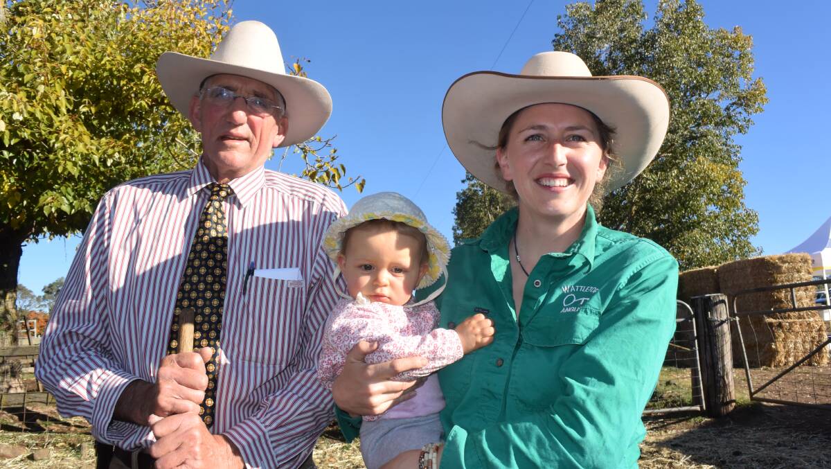Wattletop's Lock Rogers and his daughter Jess MacDougall with baby Sadie. After Wednesday's mighty sale the pair will focus, somewhat separately, on a new direction in Wagyu/Angus.