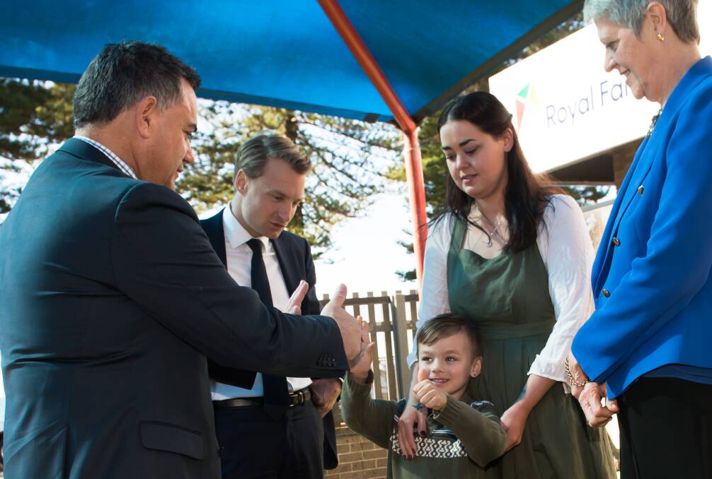 Royal Far West CEO Lindsay Cane (right) with Deputy Premier John Barilaro (left) and Member for Manly James Griffin with Dominique and his mum Gemma Callinan, of Harden.