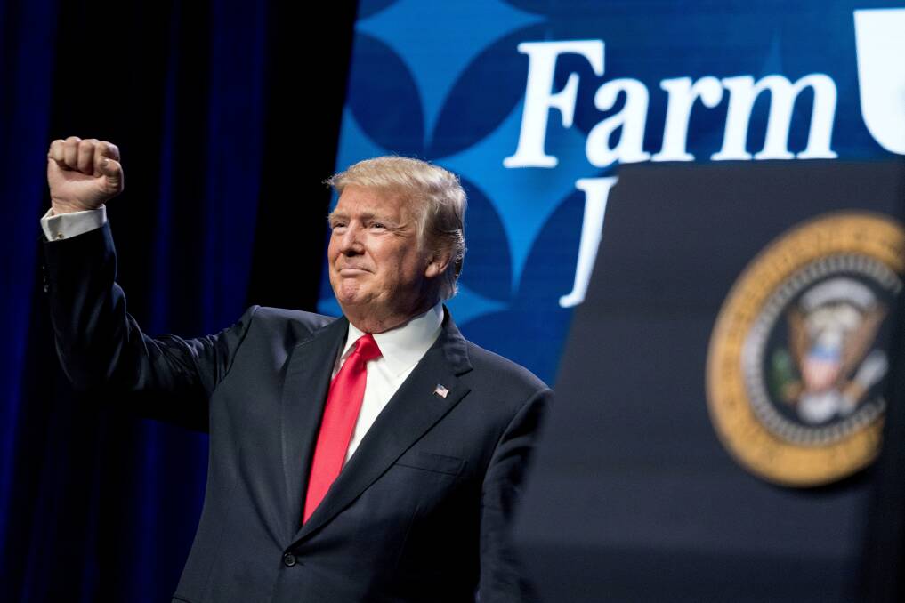 President Donald Trump pumps his fist after speaking at the American Farm Bureau Federation's Annual Convention at the Gaylord Opryland Resort and Convention Center on Monday. Photo by AP / Andrew Harnik.

