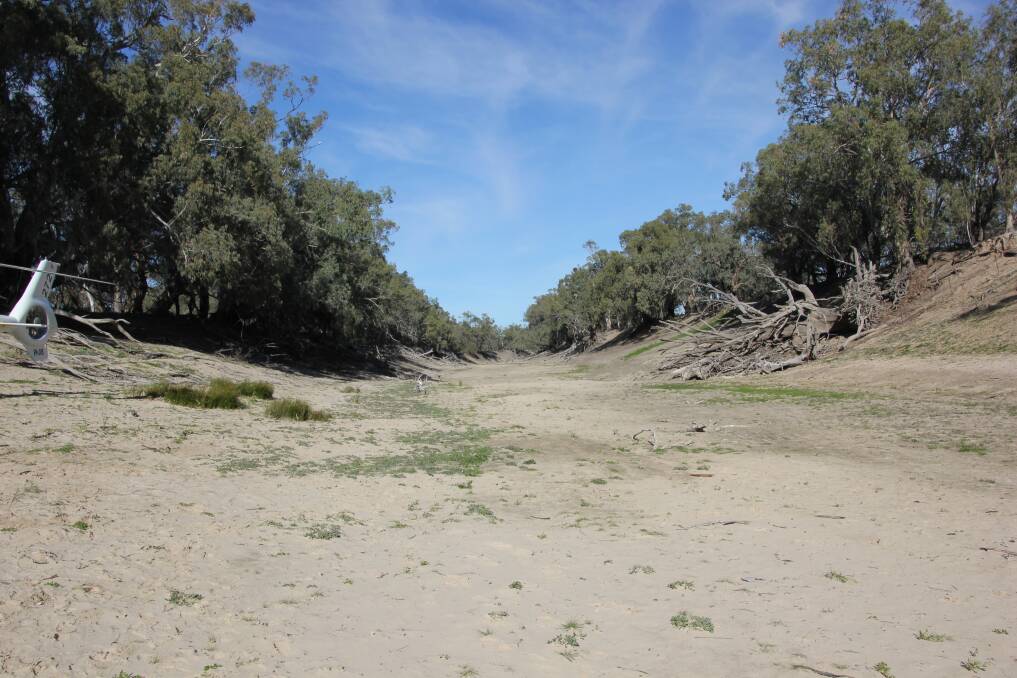 Lobby groups who argue over the Basin Plan from opposing banks have switched sides on climate change. A dry Darling River photographed in 2016. Photo Nerida Healy.