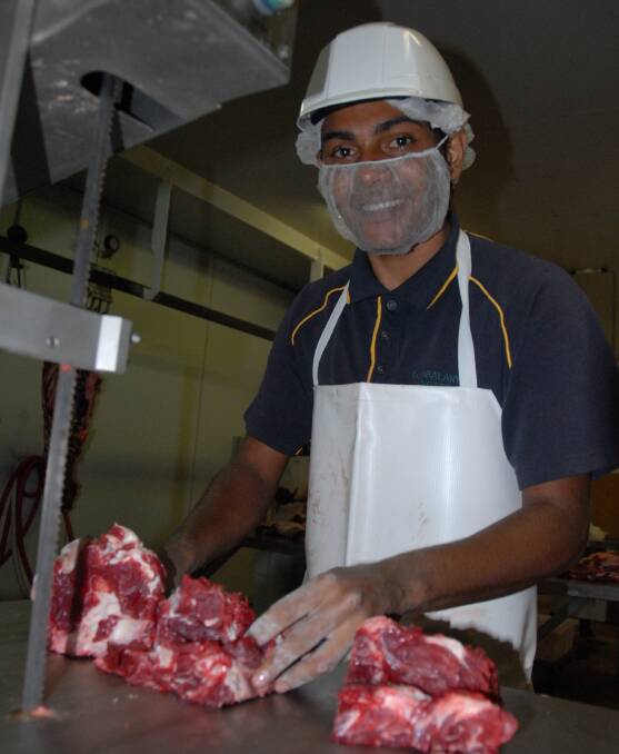 EMPOWERED: A worker at the Gunbalanya meatworks in the Northern Territory.