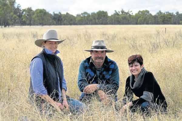 Greg and Helen Weber, Walgett, showing Environment Minister Robyn Parker the remediation work undertaken on "Fairlands" last month - which could have been illegal under existing regulations.