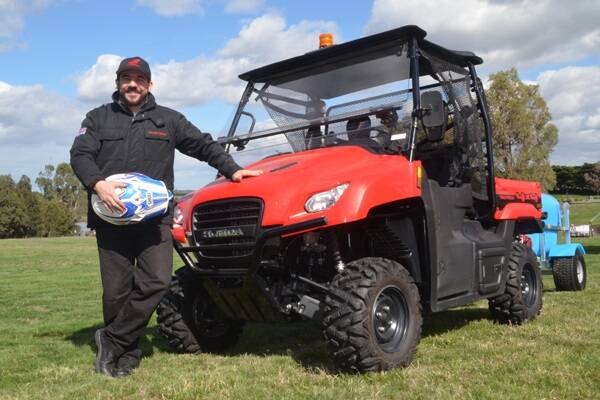 Honda Australia assistant manager product planning for motorcycles and ATVs Travis Maher, Melbourne, with a Honda MUV 700 Big Red UTV.