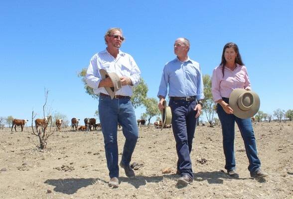 Premier Newman speaks with Longreach property owners Sam and Belinda Coxon.