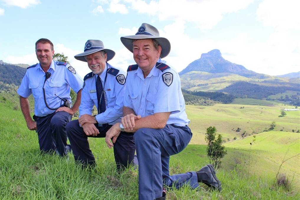 UQ-accredited farm officer Geoff Walker, deputy general manager Chris Burgess, Palen Creek Correctional Centre, and farm officer Paul Wimmer, atop Punishment Hill, overlooking the facility.