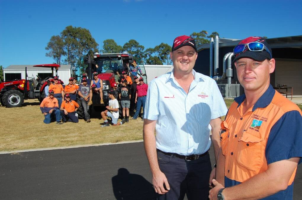 McDonald Murphy Machinery, Bundaberg manager Ross Cheshire and Burnett Youth Learning Centre farm manager Andrew Lawrence with students getting a closer look at the school&#146;s new Case IH tractors, funded by the federal government's Trades Skills Centres Program.