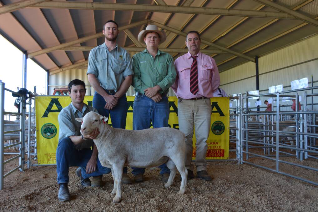 Jack and Matt Cresswell, Annalara White Dorpers, Dubbo, with selling agent Ulrich Eins, Landmark Russell, Cobar, auctioneer Bryan Kennedy, Elders stud stock, Armidale, and the $3200 top-priced ram. 