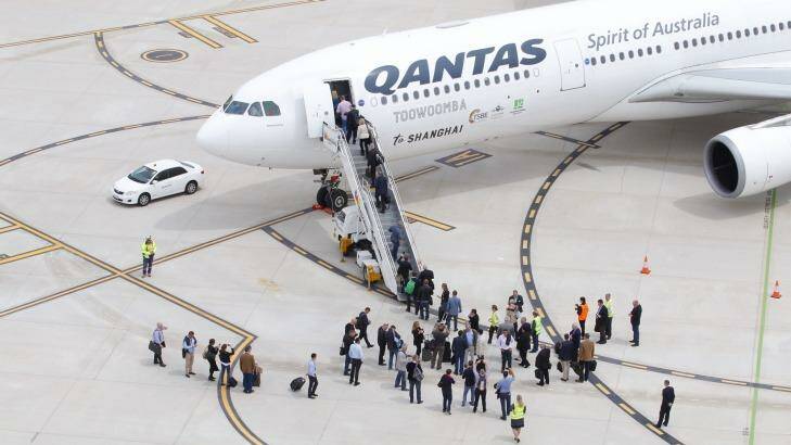 The south-west Queensland business delegation boards the Qantas A330 bound for Shanghai. Photo: Andrew Coates (Supplied)