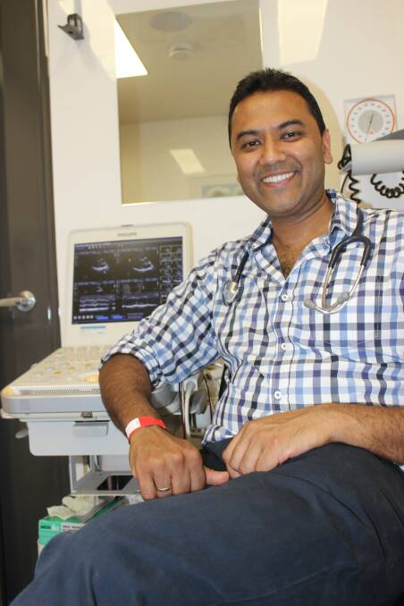 Dr Rolf Gomes in his consulting room on the Heart of Australia bus. Picture: Helen Walker