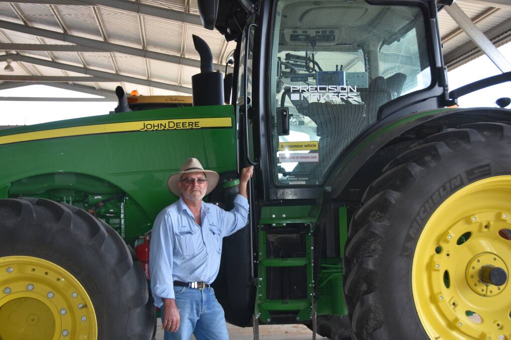 Beefwood Farms' manager Glenn Coughran with their John Deere 8345 tractor fitted with Precision Maker equipment.
