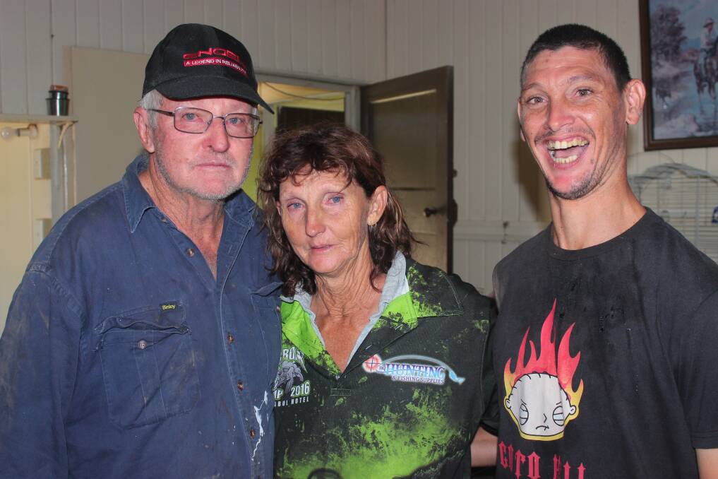 Graham Clements, Leonie Stanley and Cody Clements were forced to spend the night on their kitchen table as flood waters entered their home.