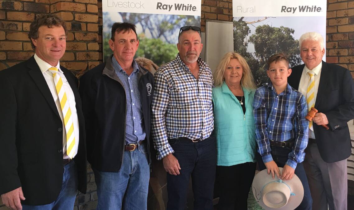 NEWCAMP SOLD: Rob Wildermuth, Ray White Rural, Roma, buyer Peter Ryan, Moura, vendors Gavin and Donna Boardman, and Ray White Rural auctioneer Bruce Smith.