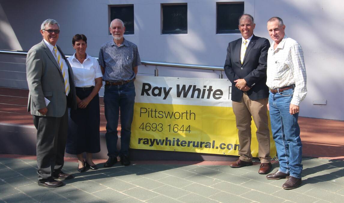 Ray White Rural's Matt Cleary with vendors Lyn Stirling and Cameron Stirling with Ray White Rural's James Croft and vendor Ian Stirling.