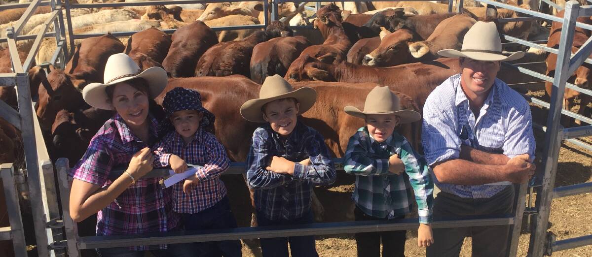 VOLUME VENDORS: Linda and Glenn Titmarsh with their sons Samuel, Joshua and Thomas who sold 730 steers and heifers at the annual Toogoolawah weaner sale.